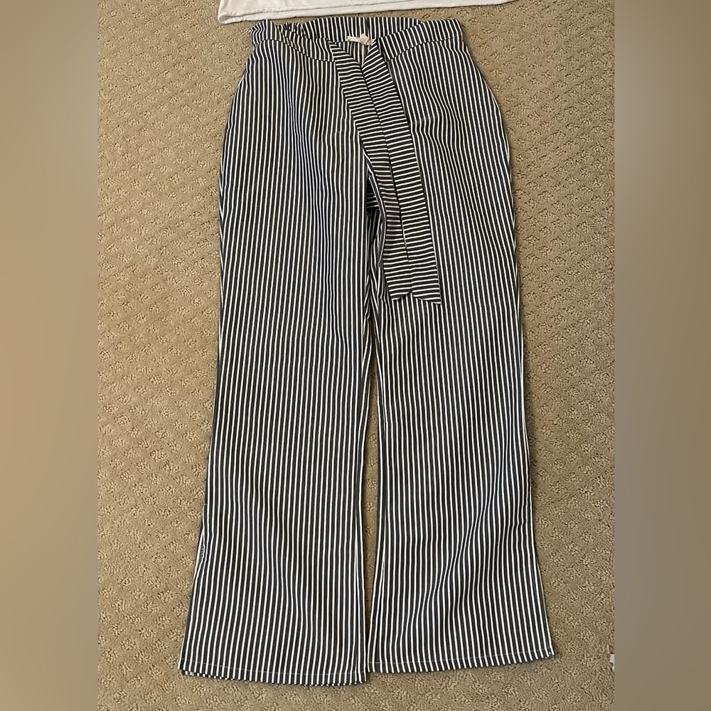 Black and white vertical striped pants
